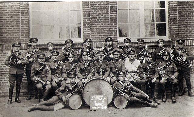 Charles band 1918.jpg - Great uncle Charles (1899-1975)  in 1918 – the clarinet player on the right. (why a clarinet in a brass band I don’t know!)  He was a cello player mainly and taught in his later years at Eton almost until he died at 76.